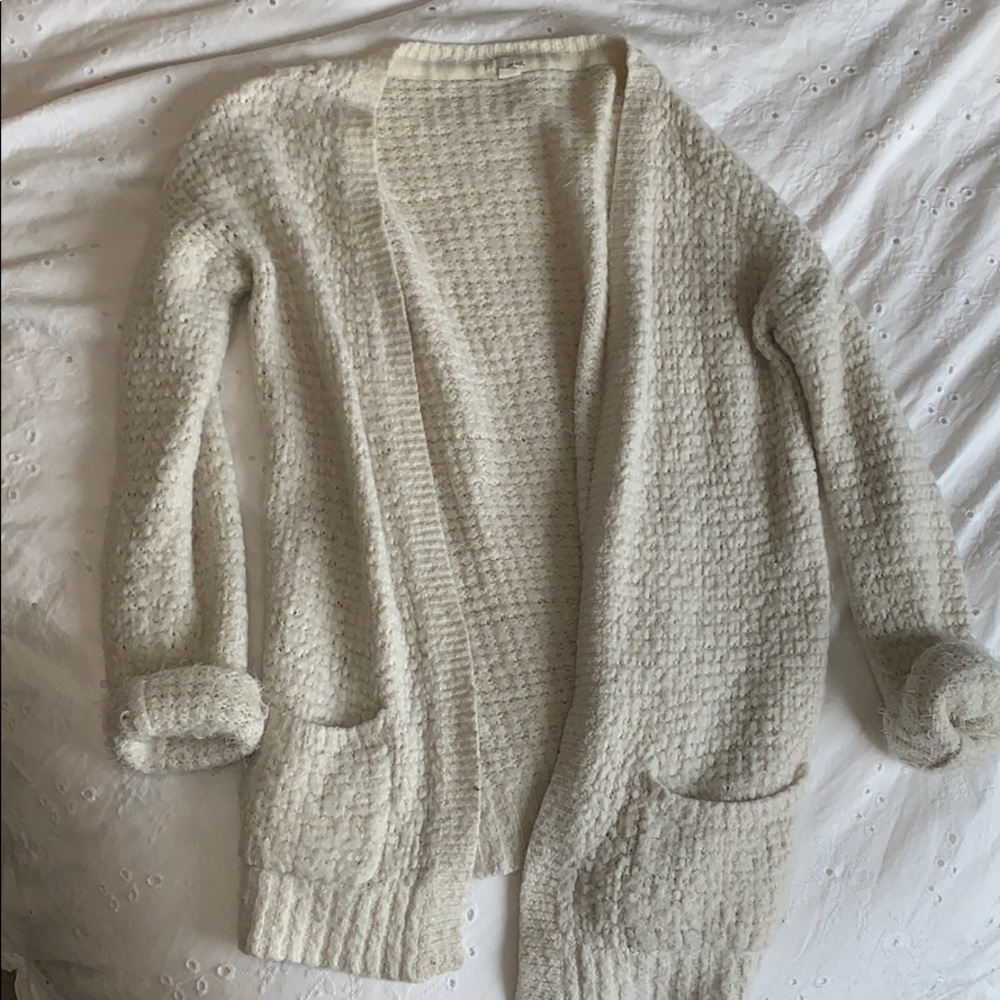 Well loved knitted cardigan